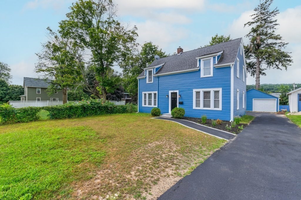 19 Converse Street Palmer, MA 01069 - Photo 2 of 28 a brick house with a yard