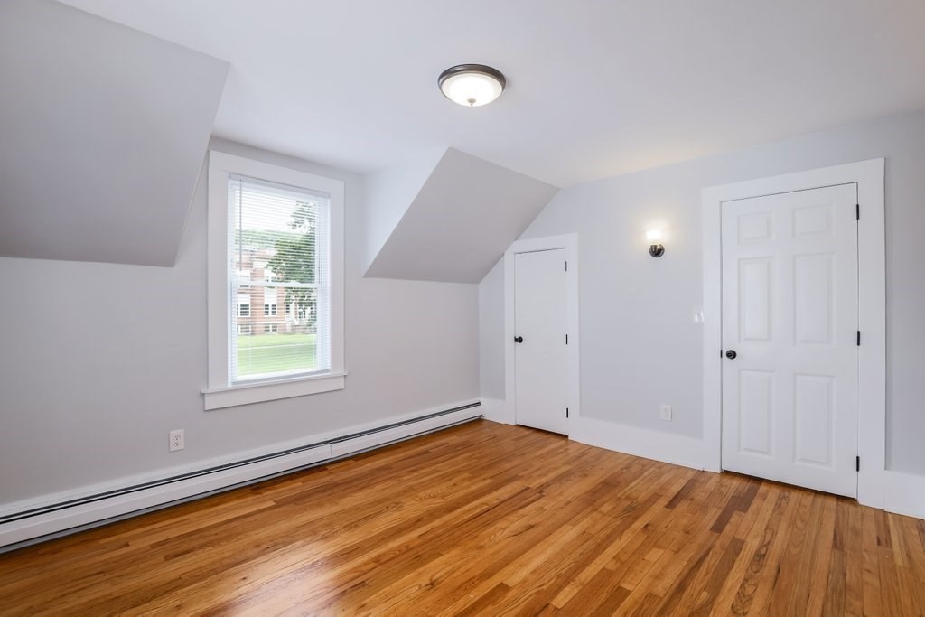 19 Converse Street Palmer, MA 01069 - Photo 25 of 28 an empty room with wooden floor and windows