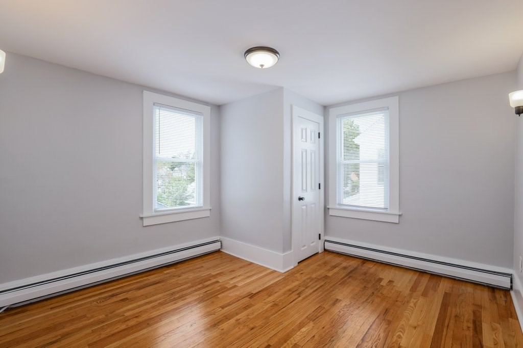 19 Converse Street Palmer, MA 01069 - Photo 27 of 28 a view of an empty room with wooden floor and a window