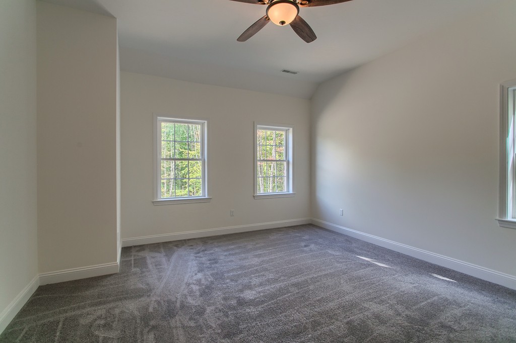 73 Meadow Road Townsend, MA 01469 - Photo 19 of 25 an empty room with a window