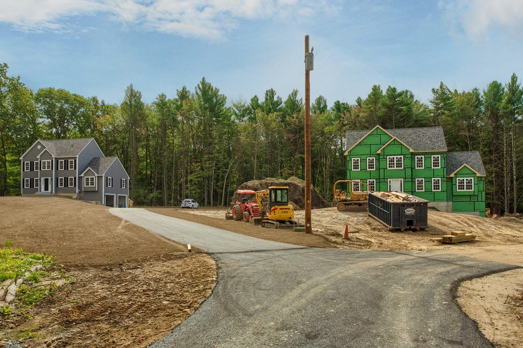 73 Meadow Road Townsend, MA 01469 - Photo 2 of 25 a view of a house with backyard and trees