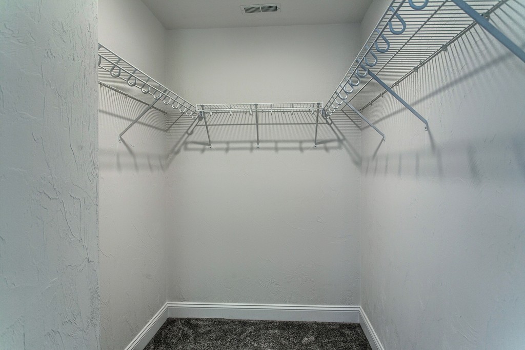73 Meadow Road Townsend, MA 01469 - Photo 25 of 25 a view of a room with racks on the wall