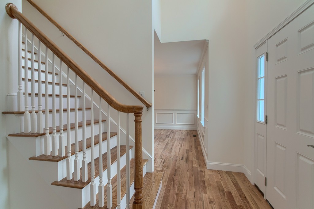 73 Meadow Road Townsend, MA 01469 - Photo 8 of 25 a view of entryway with wooden floor