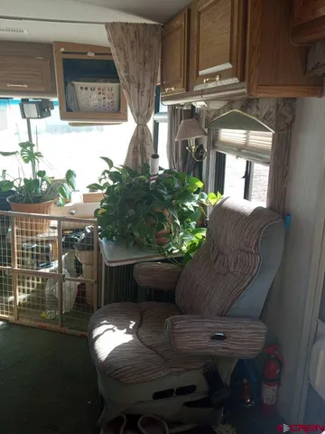 a room with a door and a rug