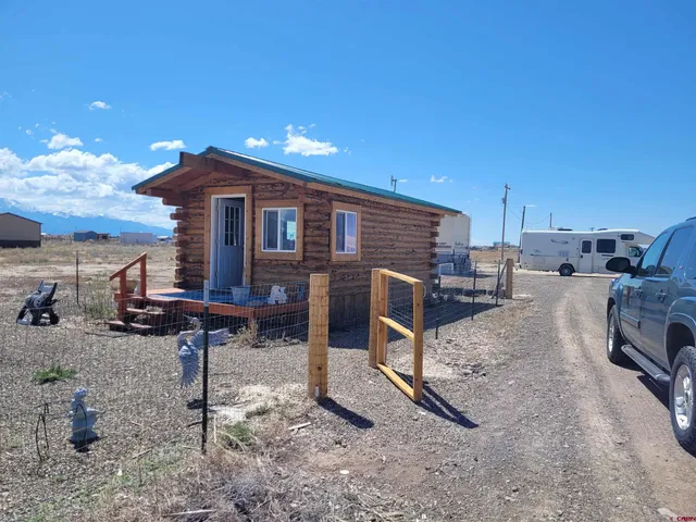 a view of a chairs and tables in the patio