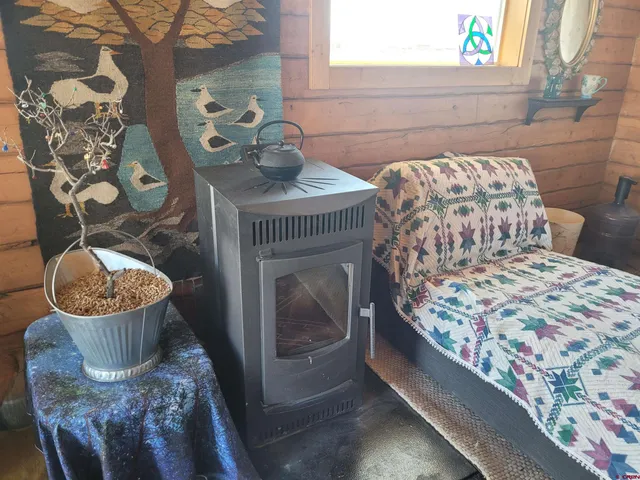 a balcony with table and chairs