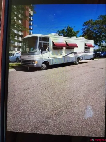 a cars parked on the side of a street