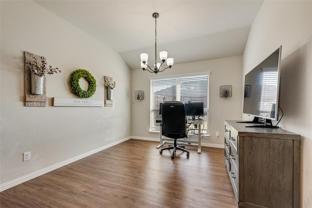 343 Amber Lane Nevada, TX 75173 - Photo 18 of 33 a view of a livingroom with workspace and a window