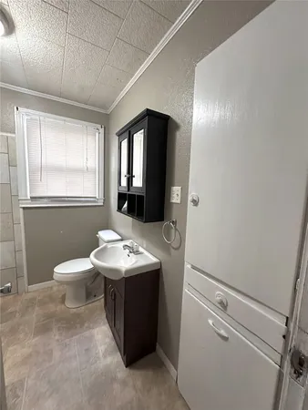a bathroom with a bathtub and shower