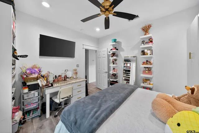 a bed room with a bed and a window