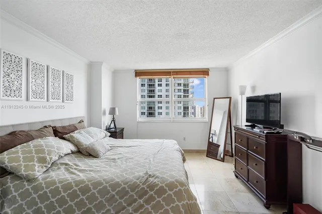 a room with furniture and flat screen tv