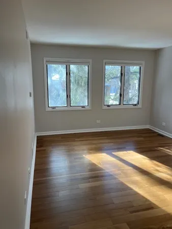 a view of staircase with wooden floor and stairs
