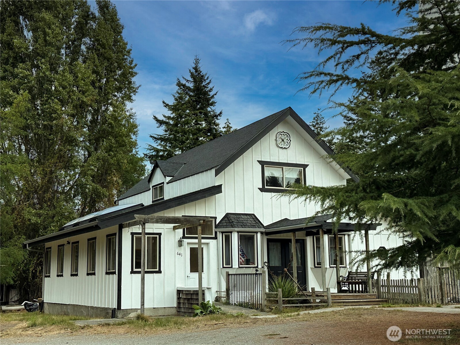 a front view of a house with a porch