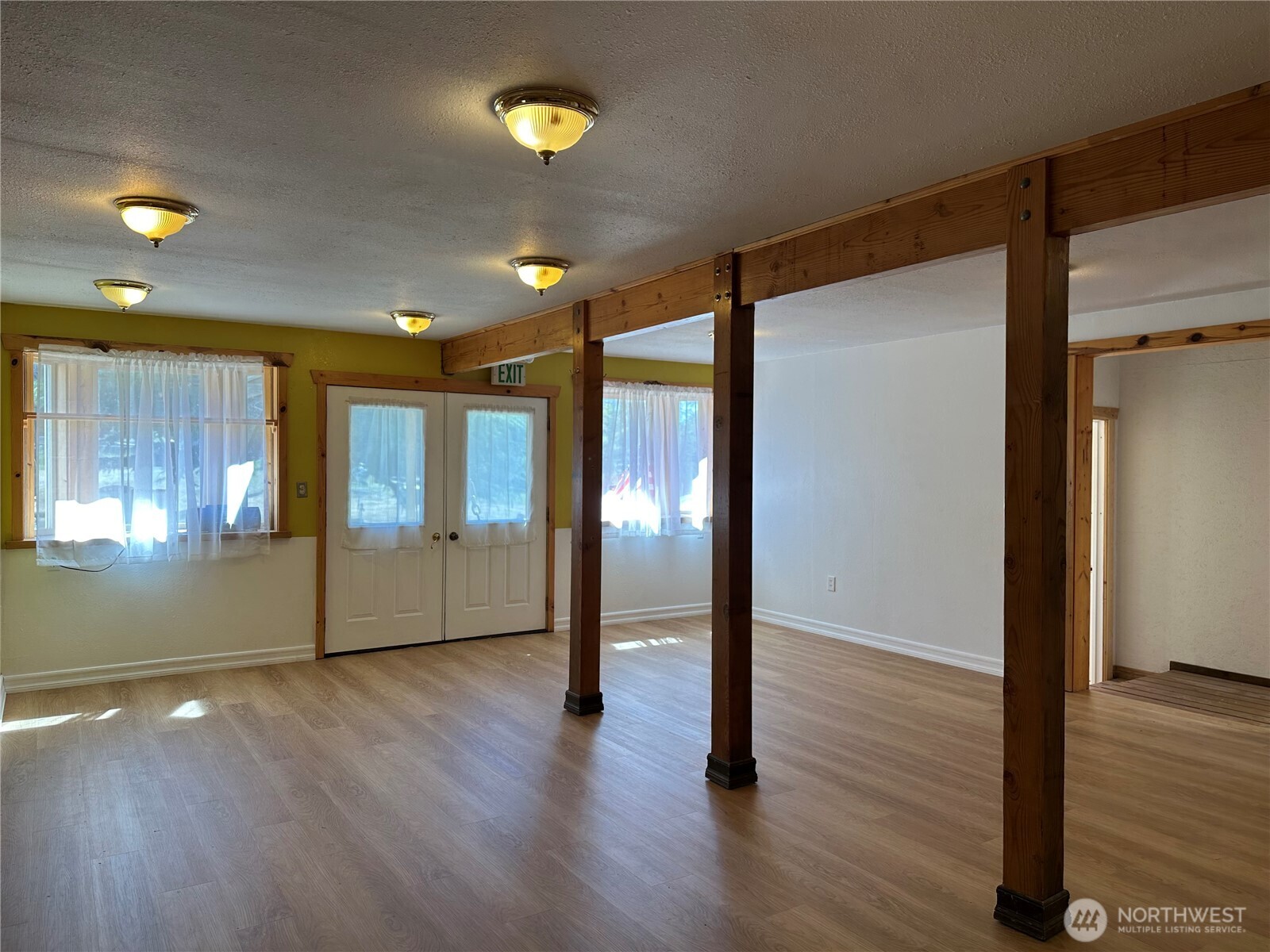 641 Decatur Head Drive Decatur Island, WA 98221 - Photo 12 of 40 a view of empty room with wooden floor and fan