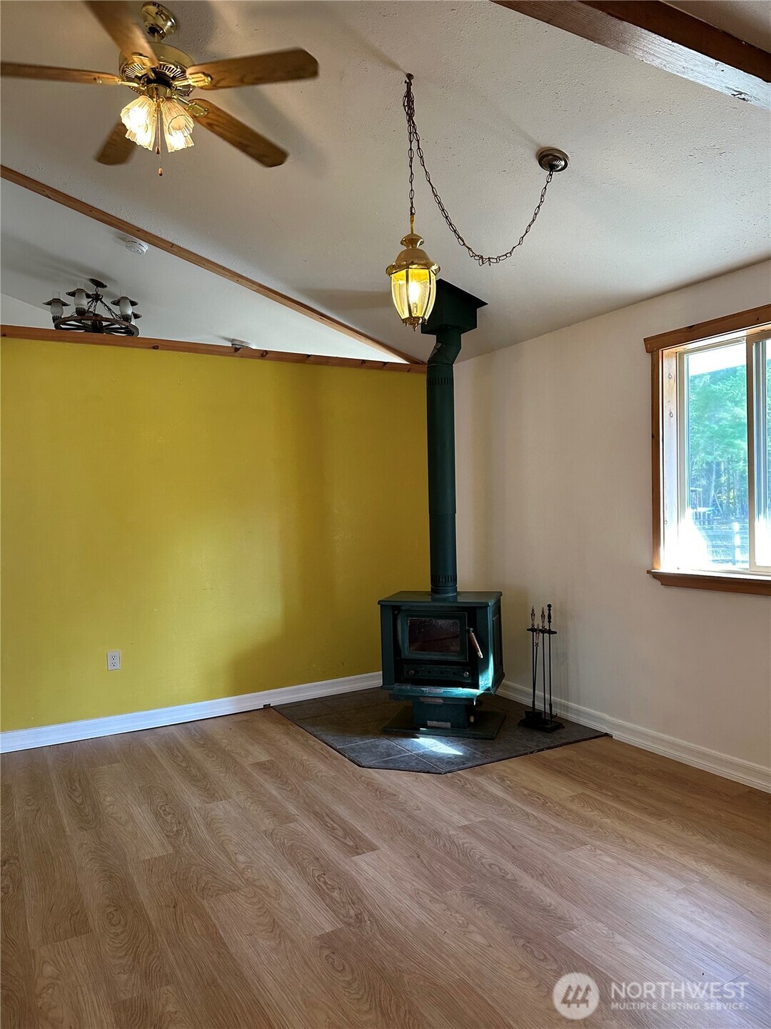 641 Decatur Head Drive Decatur Island, WA 98221 - Photo 14 of 40 a view of a room with wooden floor fan and windows