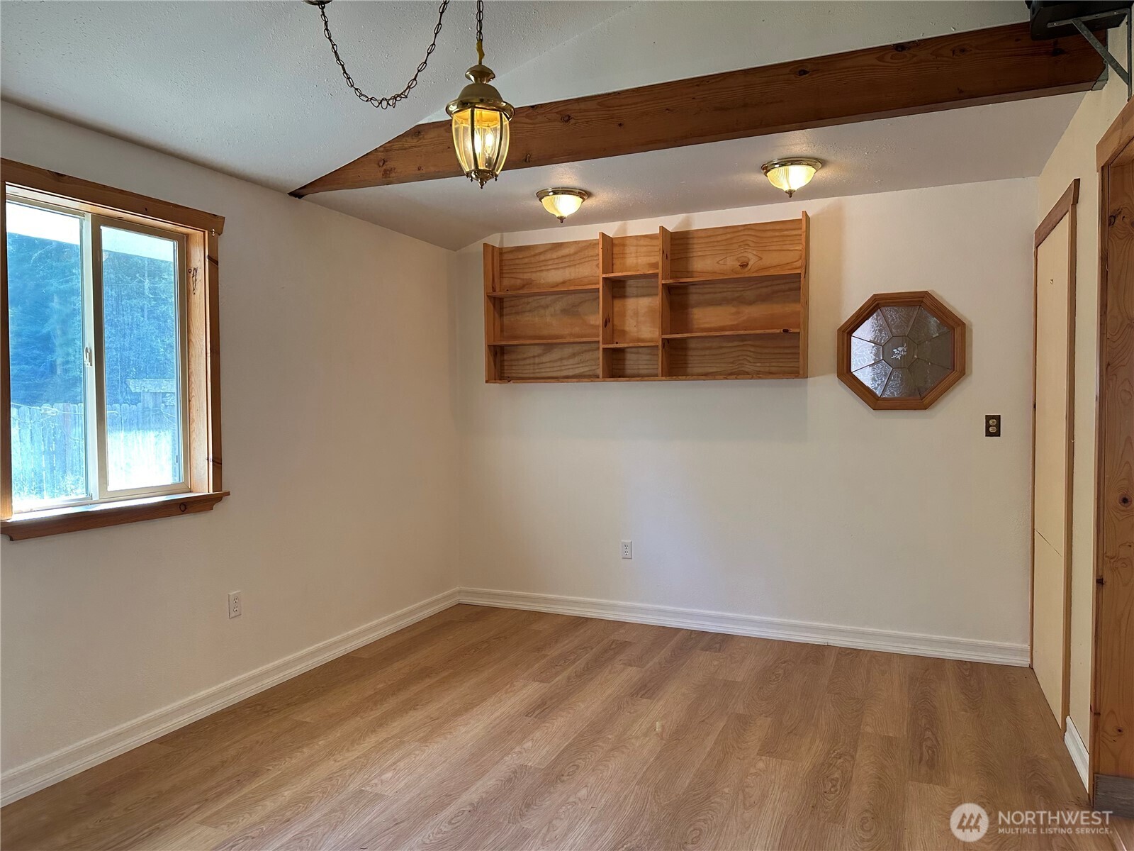 641 Decatur Head Drive Decatur Island, WA 98221 - Photo 15 of 40 a view of a room with wooden floor and windows