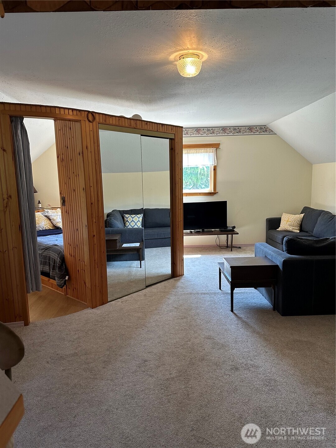 641 Decatur Head Drive Decatur Island, WA 98221 - Photo 23 of 40 a living room with furniture and a rug