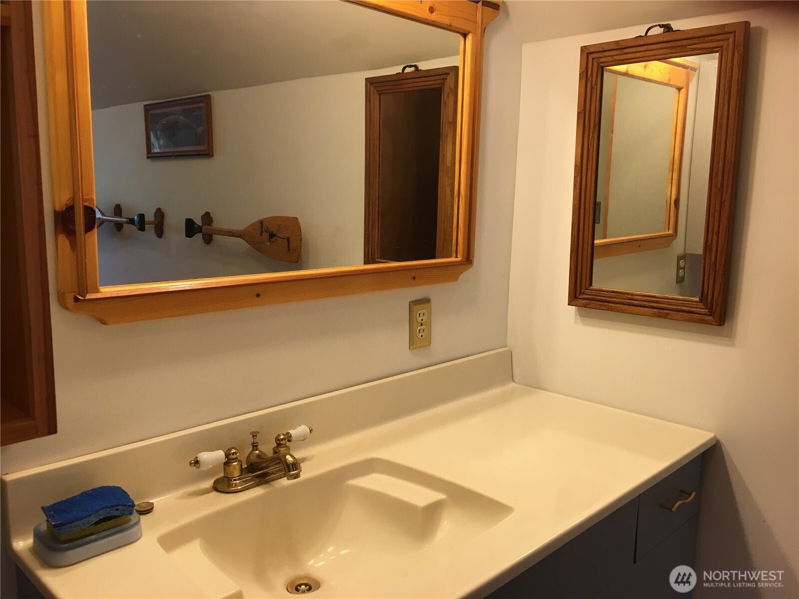 641 Decatur Head Drive Decatur Island, WA 98221 - Photo 27 of 40 a bathroom with a sink and a mirror