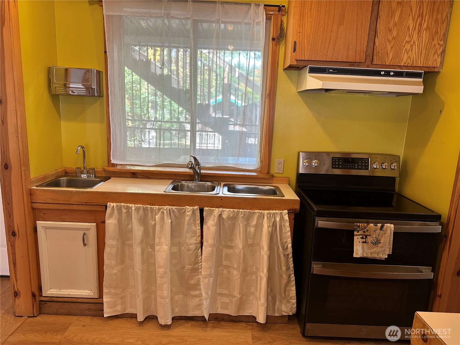 641 Decatur Head Drive Decatur Island, WA 98221 - Photo 6 of 40 a front view of a house with barbeque and wooden floor