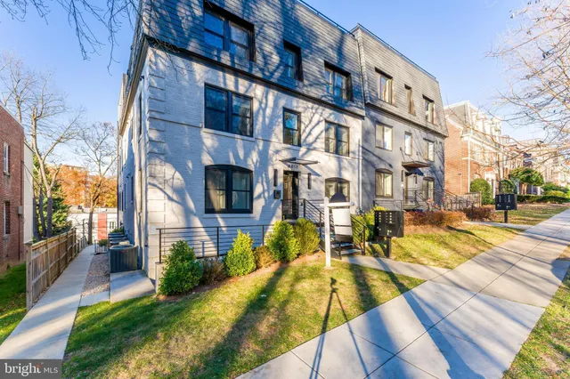 a view of a building with swimming pool