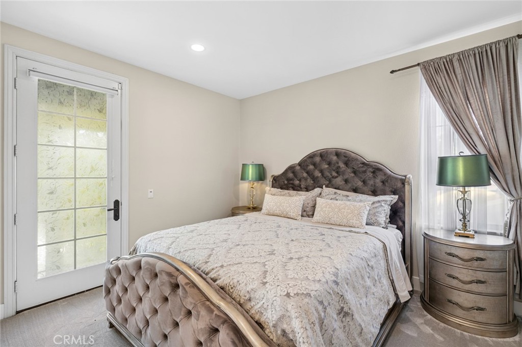 17 Lemans Newport Coast, CA 92657 - Photo 34 of 40 a bedroom with a bed and a window