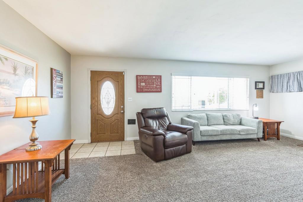 1350 Coy Court El Cajon, CA 92021 - Photo 12 of 30 a living room with furniture and a window