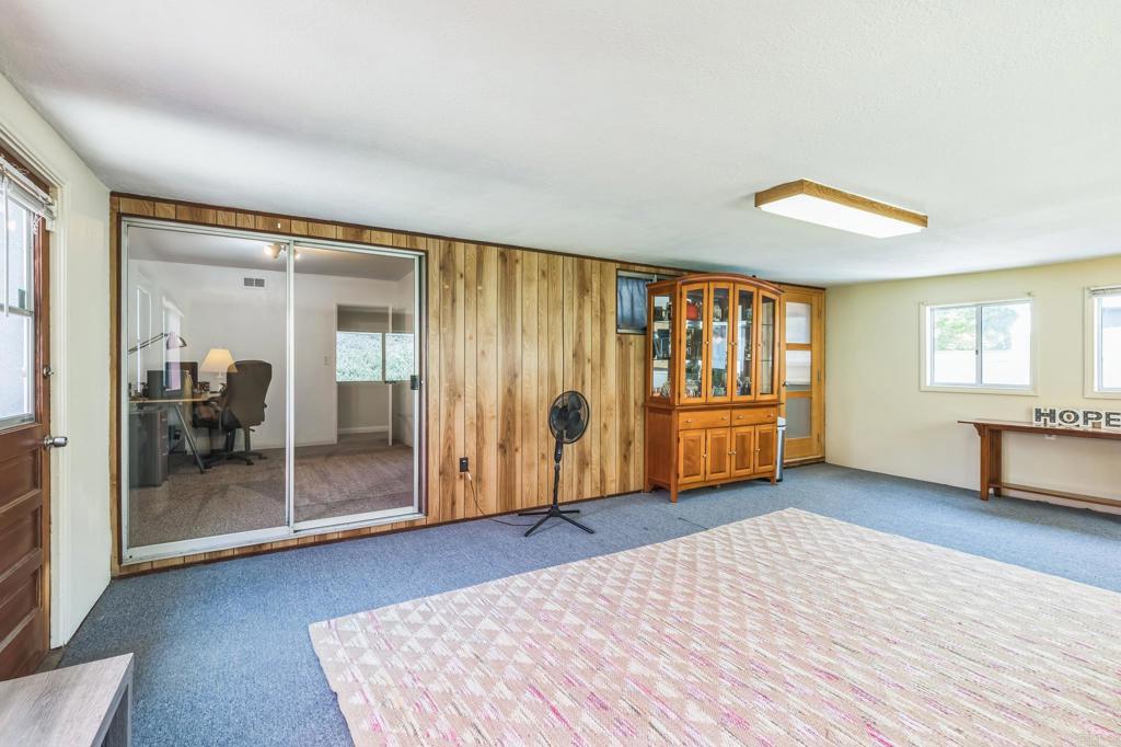 1350 Coy Court El Cajon, CA 92021 - Photo 13 of 30 a view of a bedroom with furniture and window