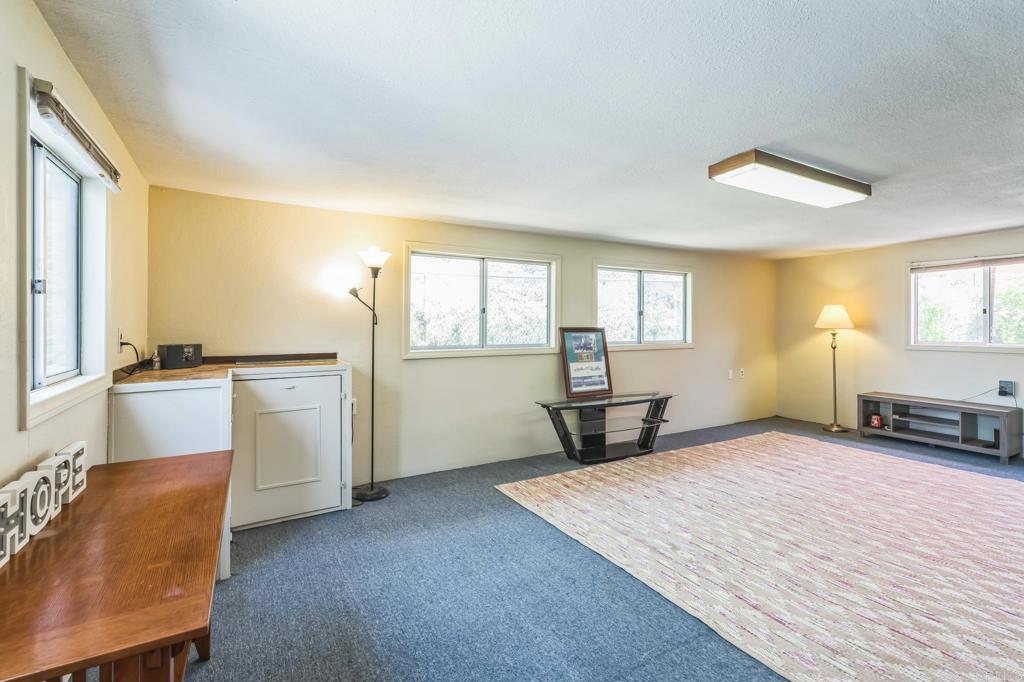 1350 Coy Court El Cajon, CA 92021 - Photo 14 of 30 a bedroom with a bed and a window