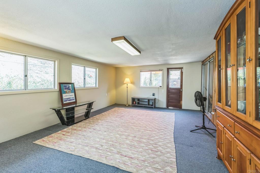 1350 Coy Court El Cajon, CA 92021 - Photo 15 of 30 a bedroom with furniture and a window