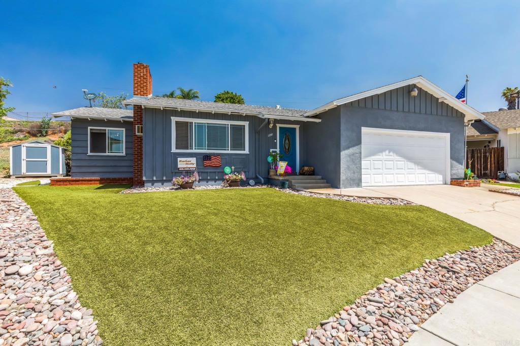 1350 Coy Court El Cajon, CA 92021 - Photo 16 of 30 a view of a house with a patio