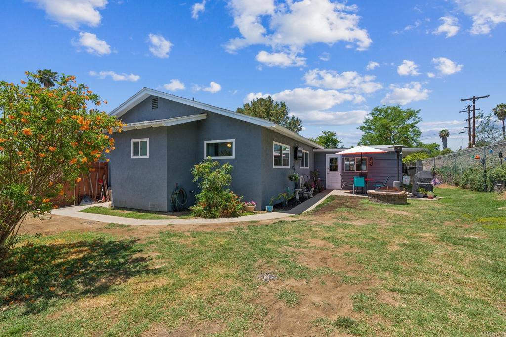 1350 Coy Court El Cajon, CA 92021 - Photo 17 of 30 a view of a house with a yard