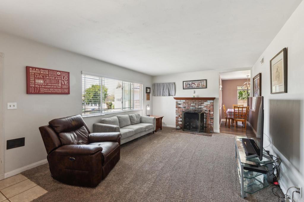 1350 Coy Court El Cajon, CA 92021 - Photo 9 of 30 a living room with furniture and a fireplace