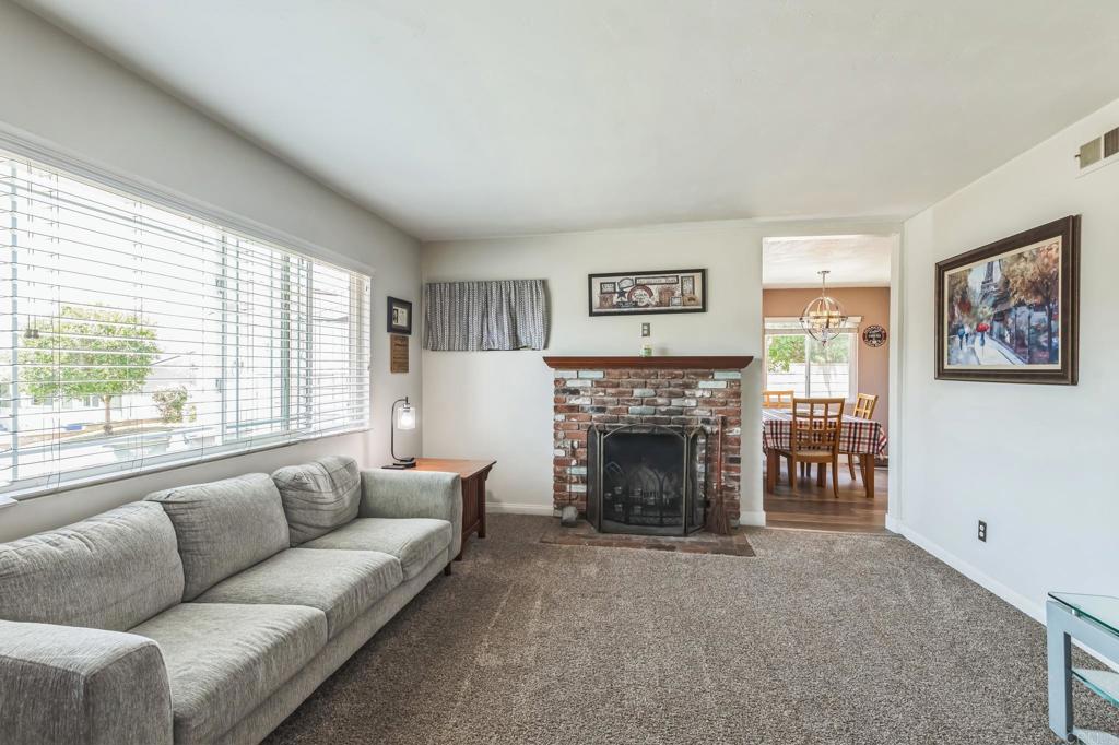 1350 Coy Court El Cajon, CA 92021 - Photo 10 of 30 a living room with furniture and a fireplace