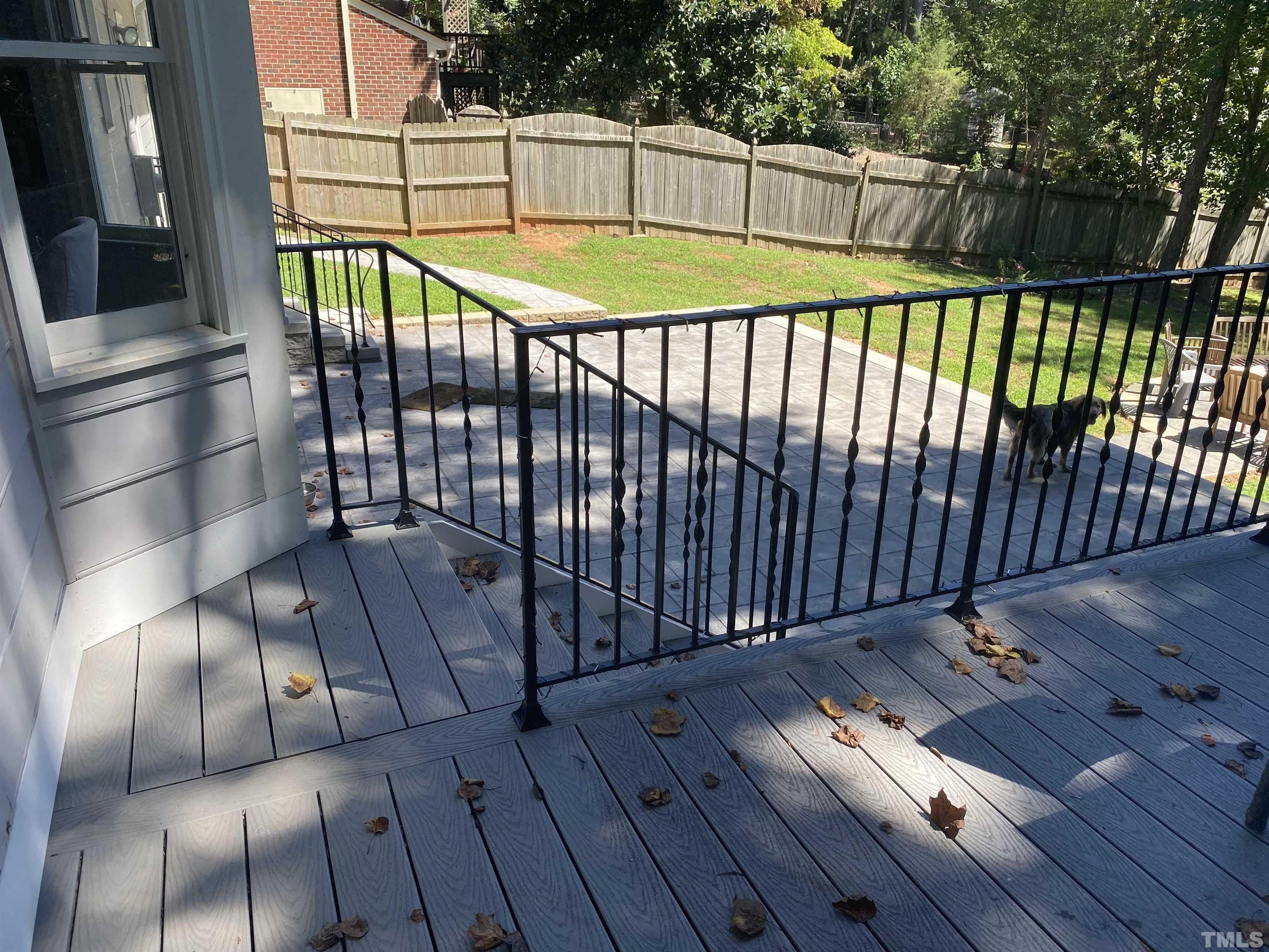1001 Sawmill Road Raleigh, NC 27615 - Photo 7 of 48 a view of a balcony with wooden floor