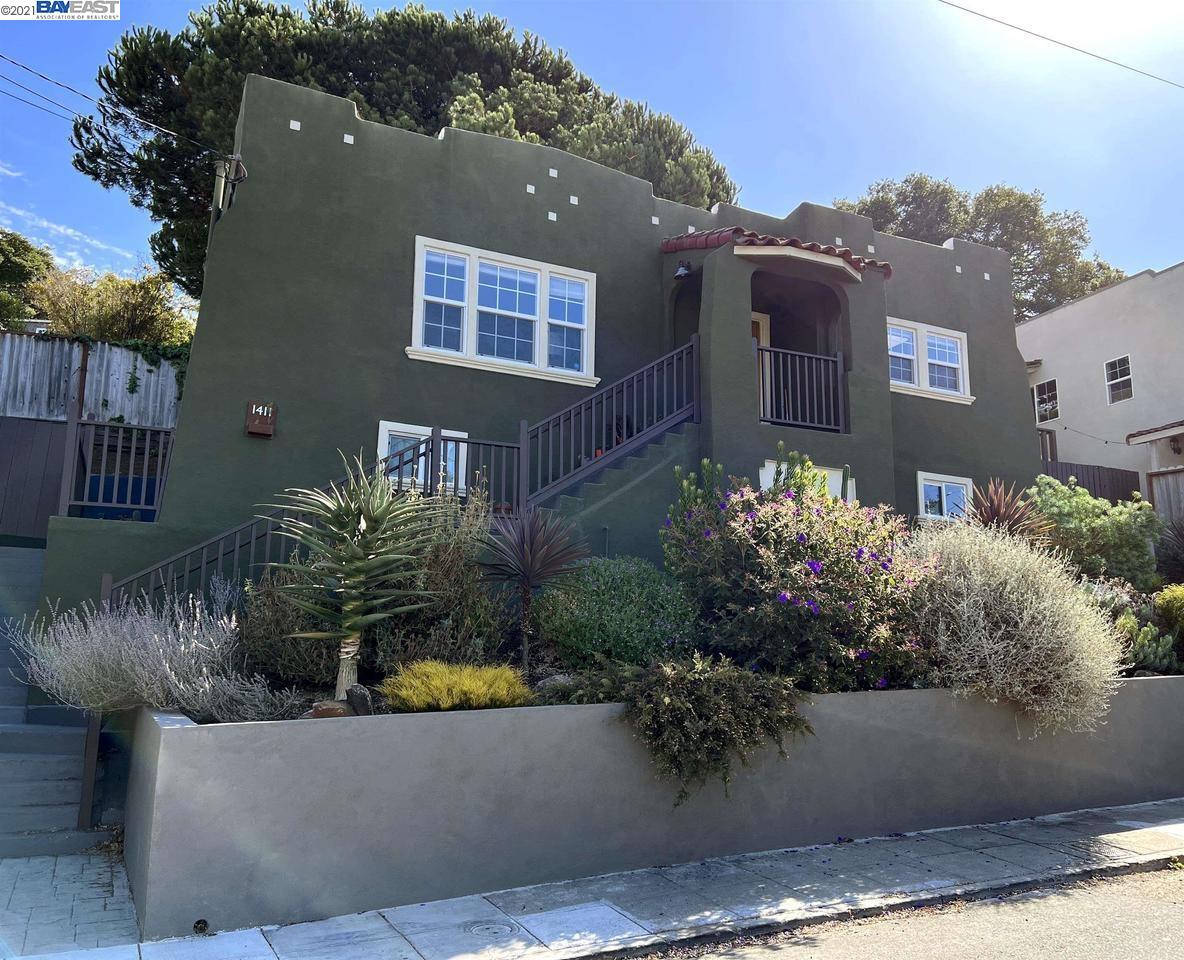 1411 Holman Road Oakland, CA 94610 - Photo 1 of 1 a view of a house with potted plants