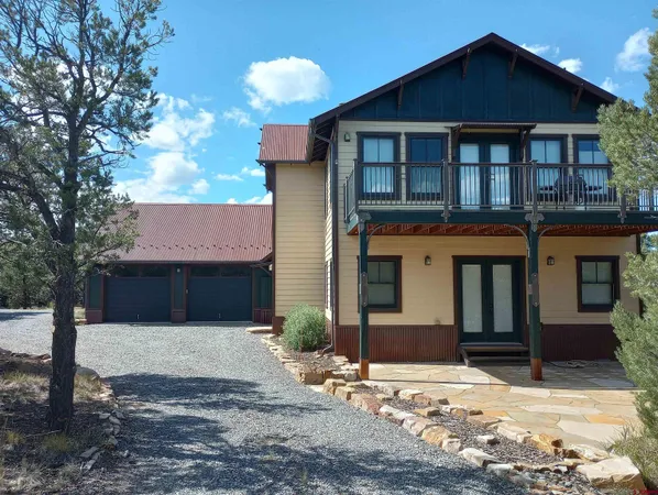 a front view of house with yard