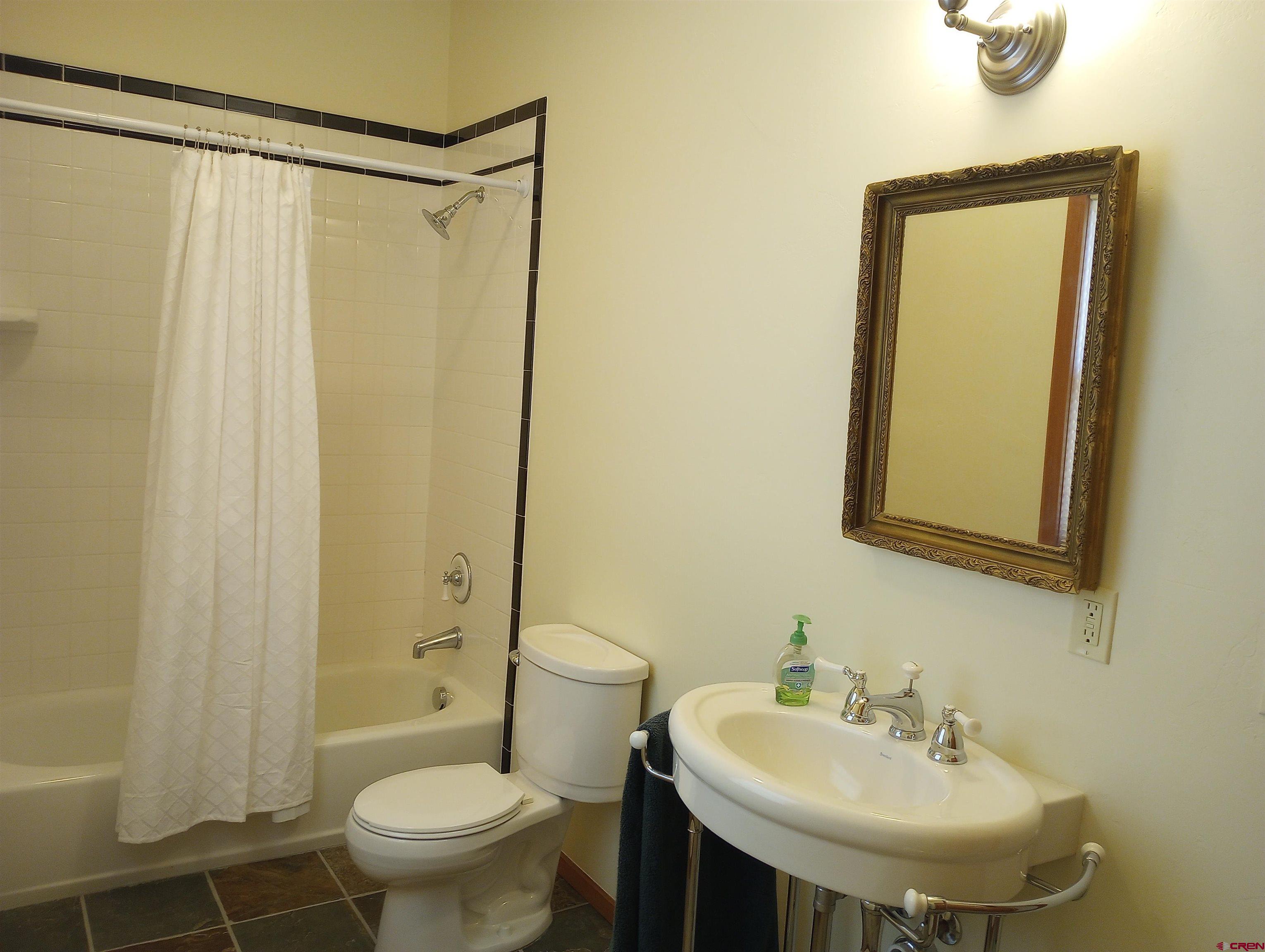 41 Oak Road Ridgway, CO 81432 - Photo 19 of 33 a bathroom with a sink toilet and shower
