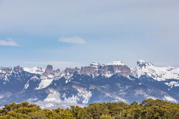 a view of a house with a mountain