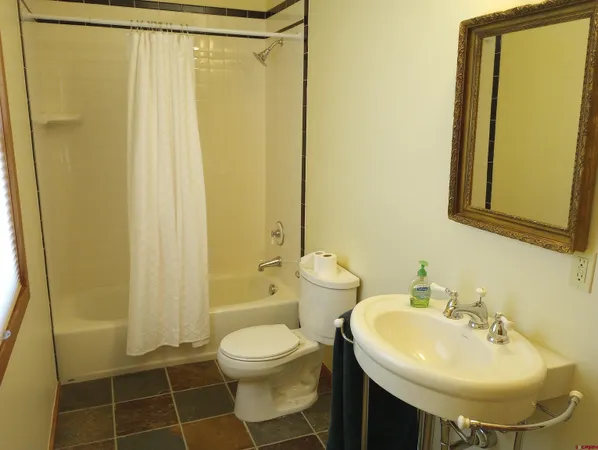a view of an entryway with a workspace