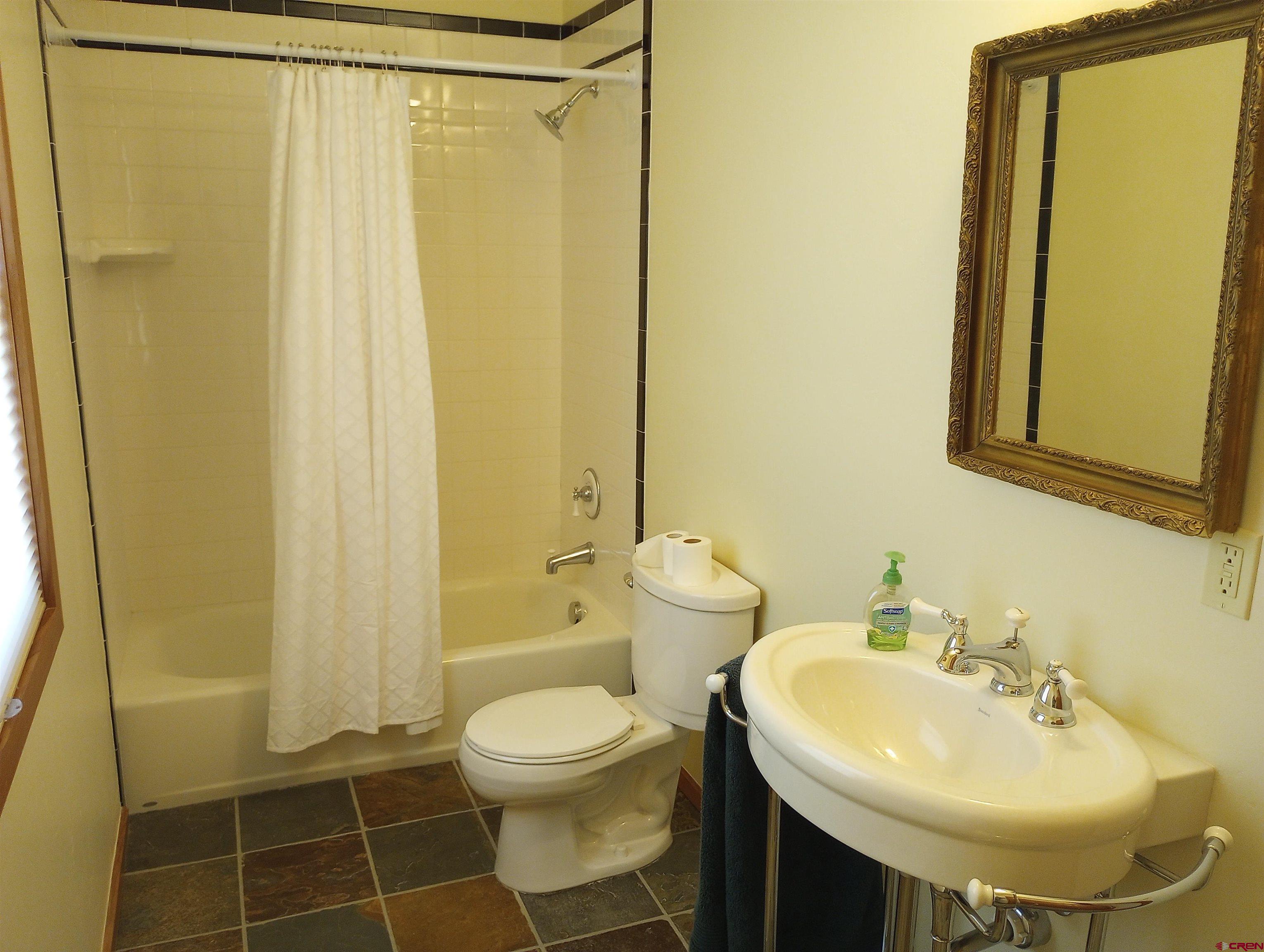 41 Oak Road Ridgway, CO 81432 - Photo 24 of 33 a bathroom with a sink toilet and shower