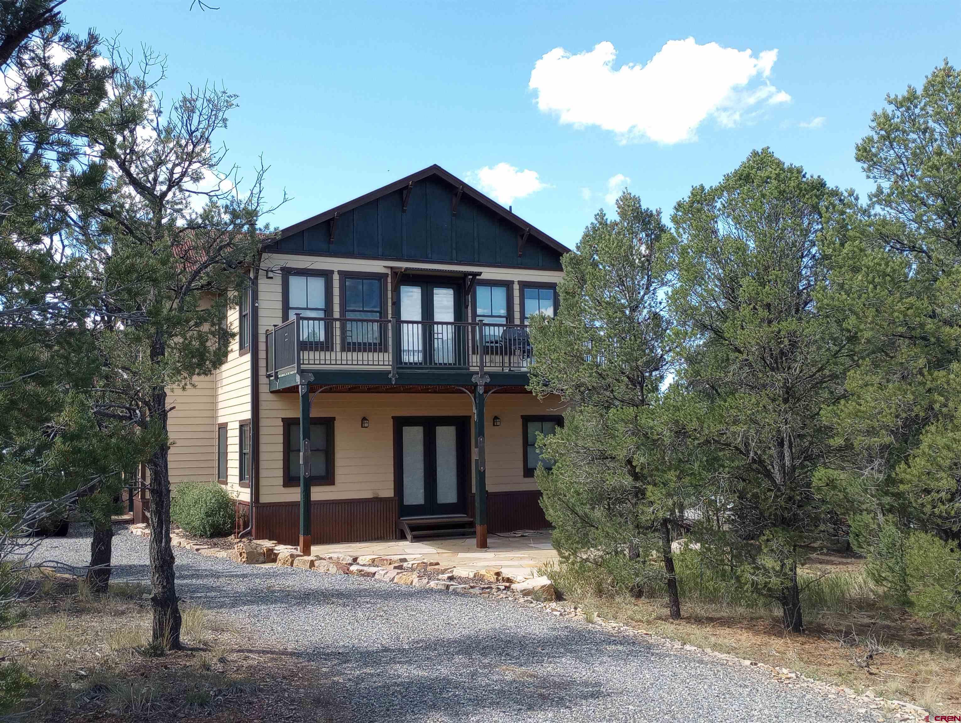 41 Oak Road Ridgway, CO 81432 - Photo 5 of 33 a view of a house with a yard
