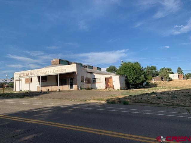500 South Market Street Cortez, CO 81321 - Photo 2 of 12 a view of a house with a street