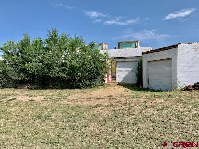 a house with trees in front of it