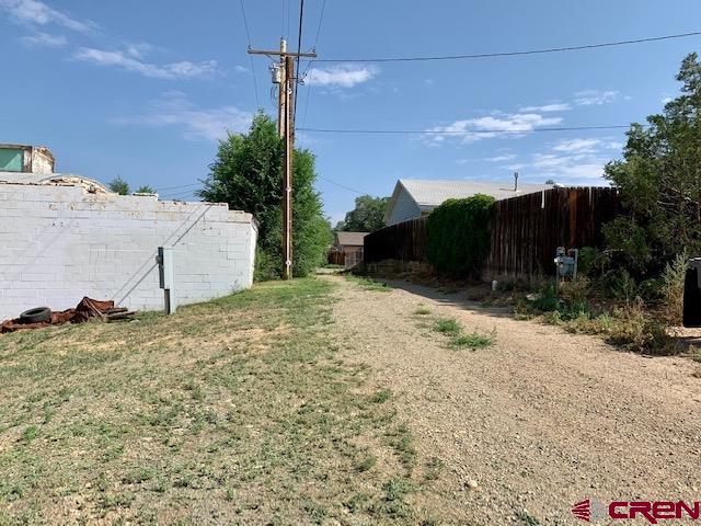 500 South Market Street Cortez, CO 81321 - Photo 6 of 12 a view of a house with a yard