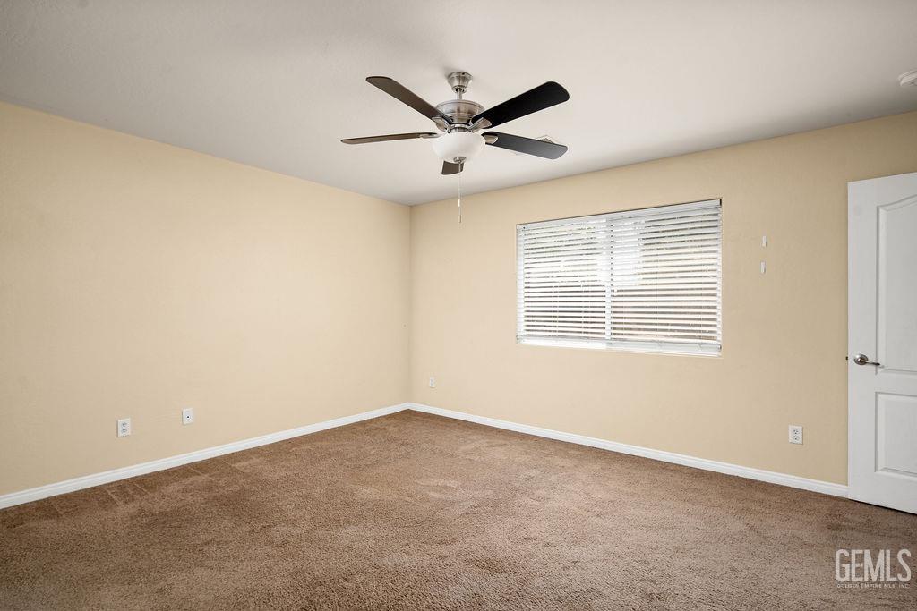 Undisclosed Address Bakersfield, CA 93312 - Photo 11 of 21 a view of a ceiling fan with a ceiling fan