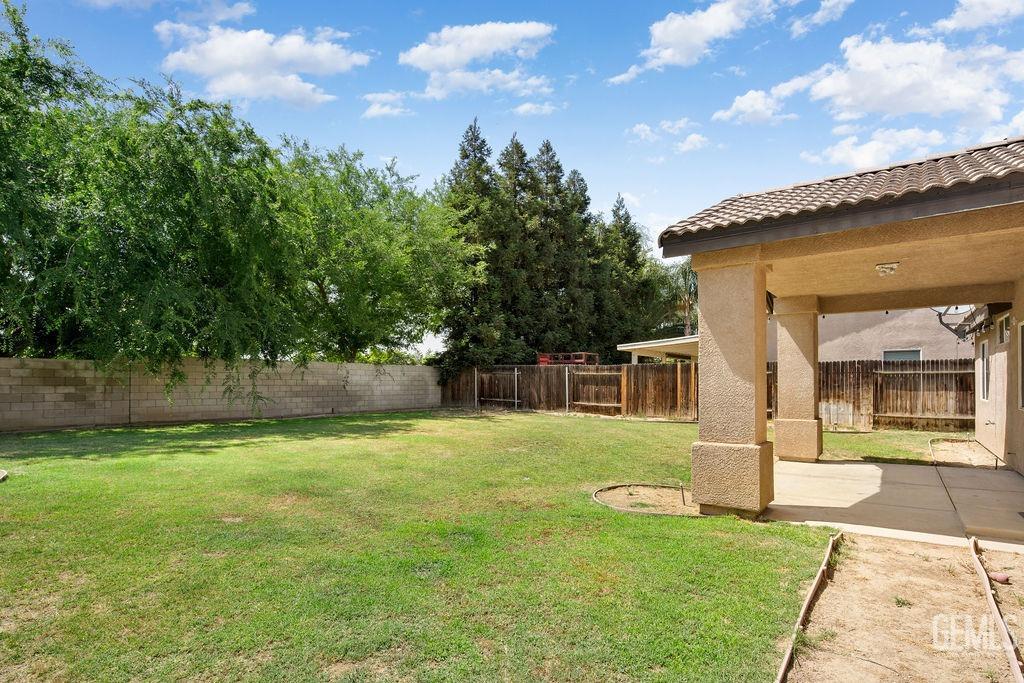 Undisclosed Address Bakersfield, CA 93312 - Photo 21 of 21 a view of a house with a yard
