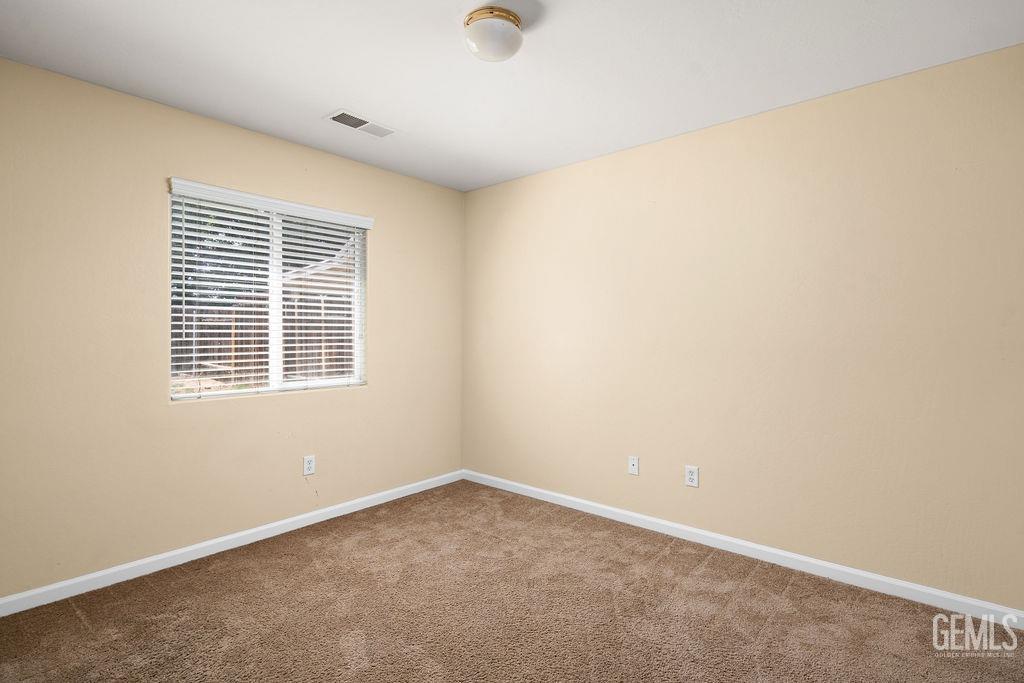 Undisclosed Address Bakersfield, CA 93312 - Photo 5 of 21 an empty room with a window