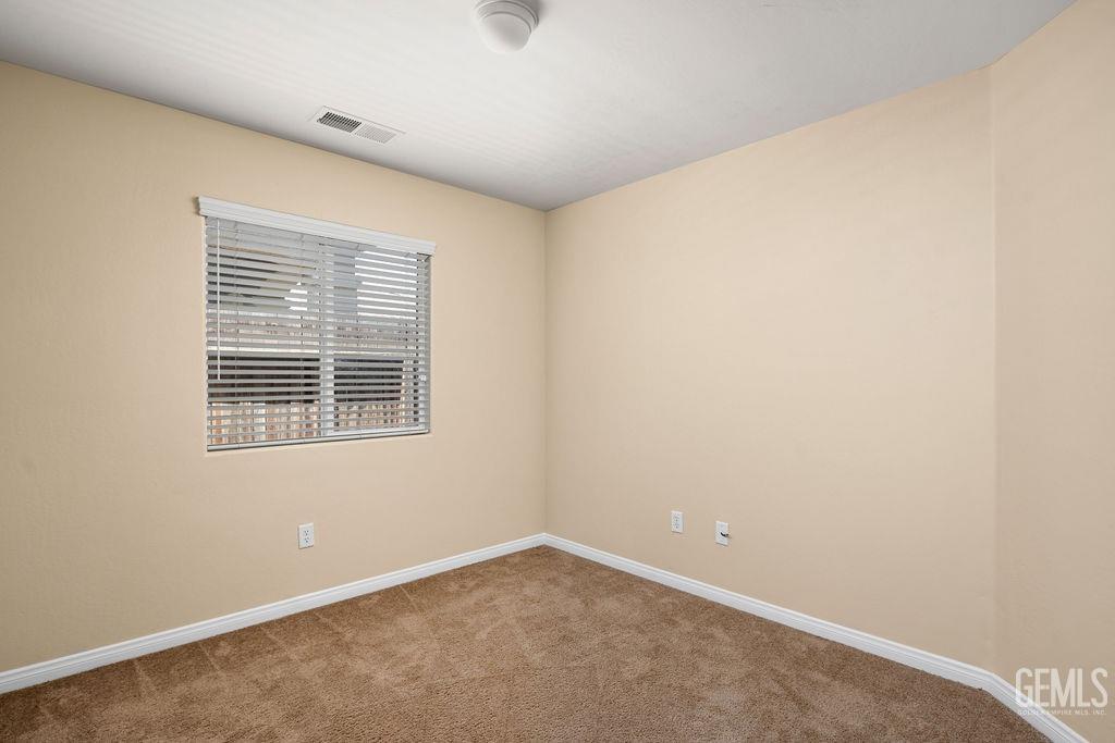 Undisclosed Address Bakersfield, CA 93312 - Photo 7 of 21 an empty room with a window