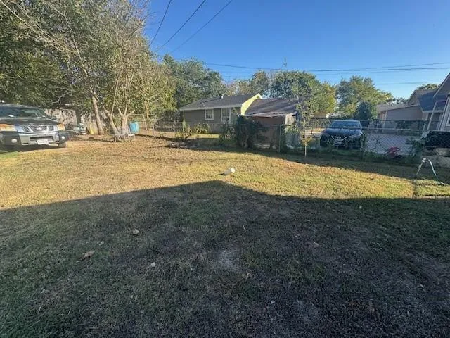 a view of a swimming pool with an outdoor space and seating area
