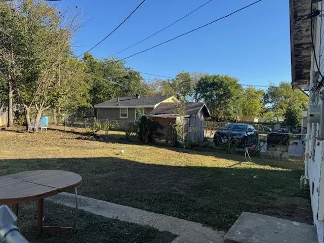a view of a house with swimming pool and sitting area